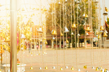 Golden and white bell group in the temple in Thailand