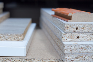 MDF, PARTICLE BOARD. Wood panels of different thicknesses and colors.