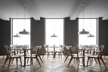 Interior of a gray brick loft cafe close up