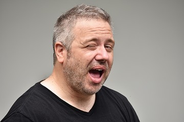 Obraz premium Caucasian Male Winking