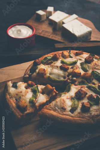 Indian Paneer Pizza With Fresh Cottage Cheese Cubes And White