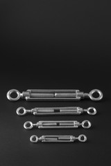 Tension hooks on a black background