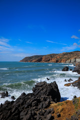 Portuguese coastline with the ocean and the sintra mountains in background. Cascais Portugal