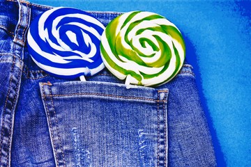 lollipop in the blue jeans pocket