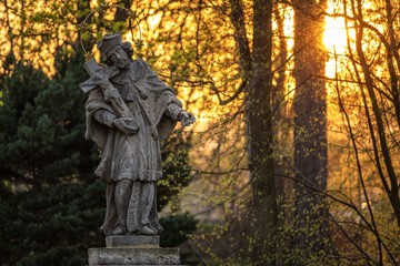 Fototapeta premium Statue at sunset