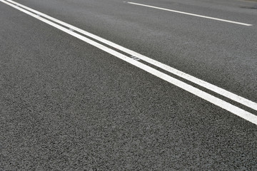 New black asphalt close up.