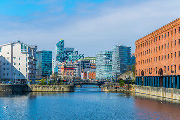 View of the business center of Liverpool through Queens dock, England