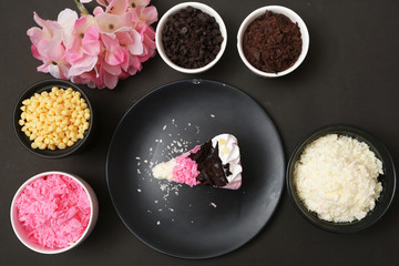 Strawberry milk cake on black background