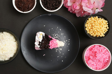 Strawberry milk cake on black background