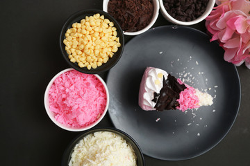 Strawberry milk cake on black background