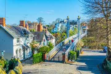 View of residential houses alongside river Dee in Chester, England - obrazy, fototapety, plakaty