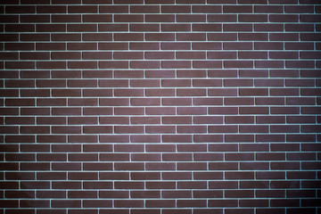 background of a brick dark wall, tile texture with a smooth pattern.