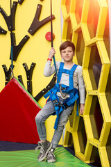 Feel yourself climbing the mountain! Full length photo of a youn