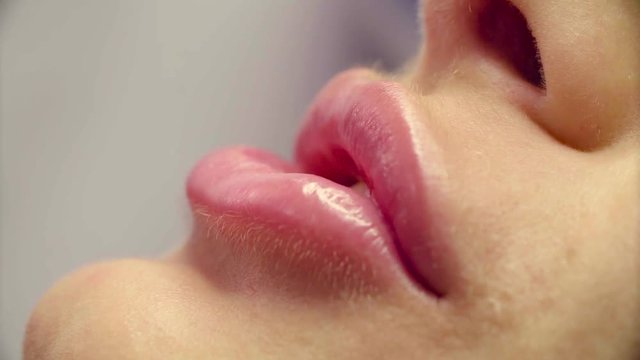 Lip injection plastic surgery. Close up lips of patient during lip augmentation