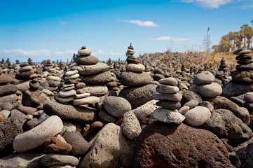 Stack of stones on the sea beach. Tenerife island.
