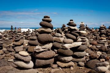 Stack of stones on the sea beach. Tenerife island.