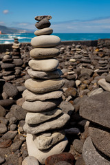 Stack of stones on the sea beach.