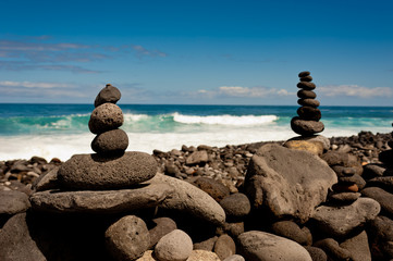 Stack of stones on the sea beach.