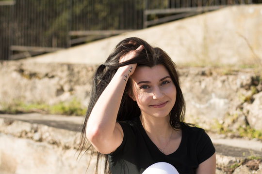 Young girl in old fotball stadium