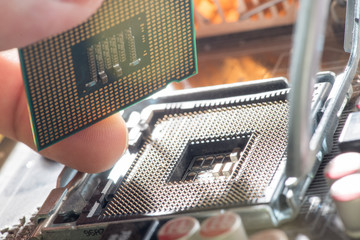 Close up of Electronic CPU on Mainboard computer.