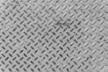 Metallic background. A steel plate with spikes as an abstract background.