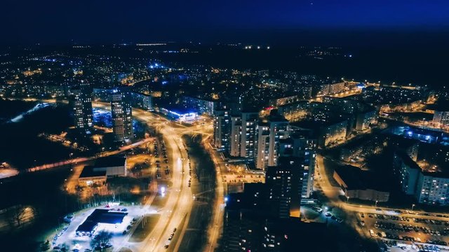 Drone Night Timelepse Riga city block off flats Drone Flight daugava, latvia river