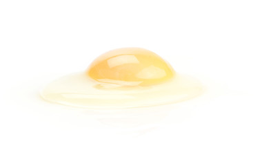 One raw chicken yolk isolated on white background.