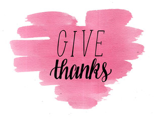 Hand lettering Give thanks on watercolor heart.