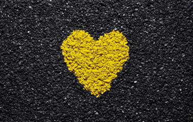 Yellow heart on the black background, stones, gravel and shingle, love wallpaper, valentine