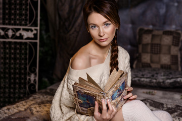 Young girl reading fairy tale