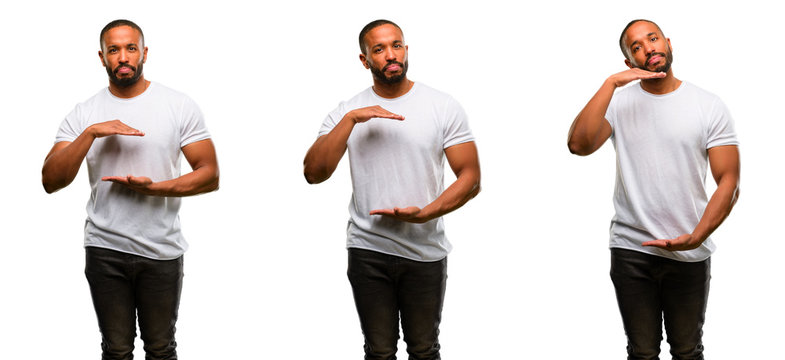African american man with beard holding something, size concept