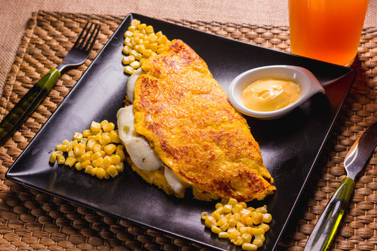 Cachapa, corn tortilla with cheese and butter