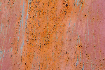 Old Red Rusty Plaster Wall With Worn Surface Vertical Empty Grunge Background. Brown Red Brickwall With Shabby Stucco Finishing Layer Isolated Texture. Empty Painted Vintage Grunge Wallpaper