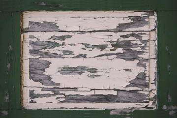 Texture of an old frame made of wood with weathered dull paint, background.