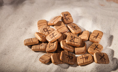 Runes foresight lying on the sand