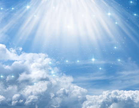 divine, mystical, angelic blue background with cloudy sky, rays of light and stars 