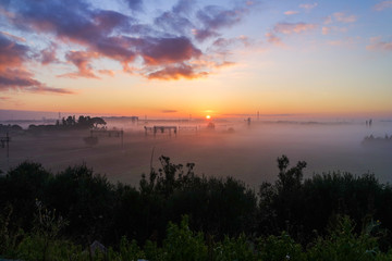 Fototapeta na wymiar sunrise near a railways