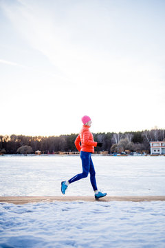 Picture of sports girl on morning exercise in winter