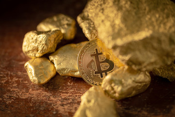 Gold bitcoin physical and Gold nugget grains. Concept mining cryptography