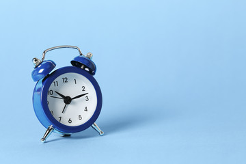 Fototapeta na wymiar blue alarm clock