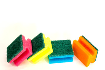 multicolored dish washing sponge on white background in different positions