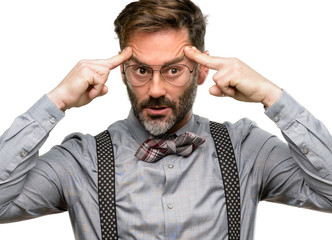 Middle age man, with beard and bow tie doubt expression, confuse and wonder concept, uncertain...