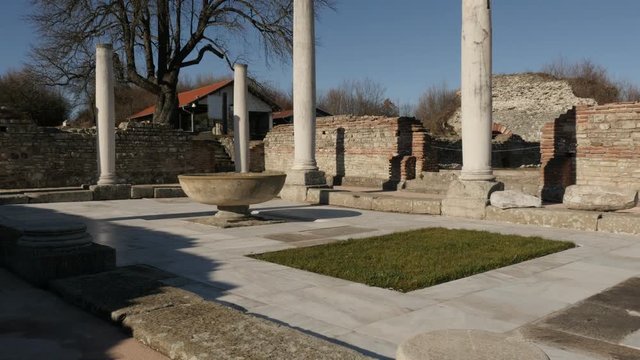 Columns and fountain inside imperial palace complex of Felix Romuliana built by Roman Emperor Galerius. The construction started in 298 AD 