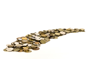money coins lie on white background going into the distance