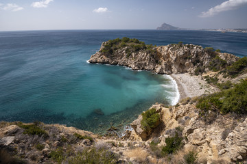Fototapeta na wymiar Between Altea and Calpe the Mascarat point area with its turquoise water beaches, Altea, Costa Blanca,Alicante province,Spain