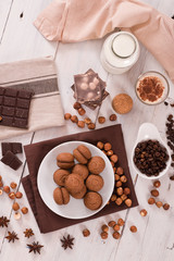 Hazelnut shortbread sandwiches filled with chocolate cream. 