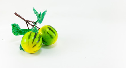 colorful plastic Toy fruits on white background