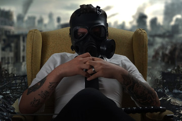 Young businessman gas mask concept