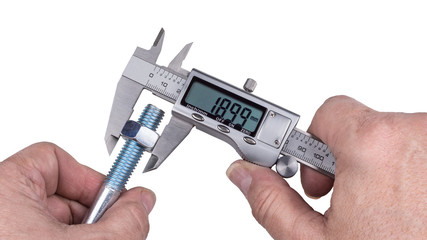 Precise measurement of bolt with nut by digital caliper. Detail of technical expert's hands holding...