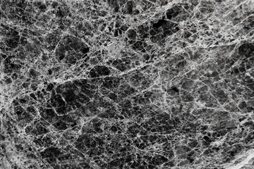 Obraz na płótnie Canvas black color marble texturee background with natural line pattern graphic supply usage